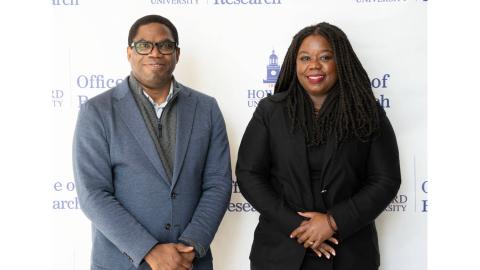Dr. Andy and Dr. Clarke attending AI Symposium